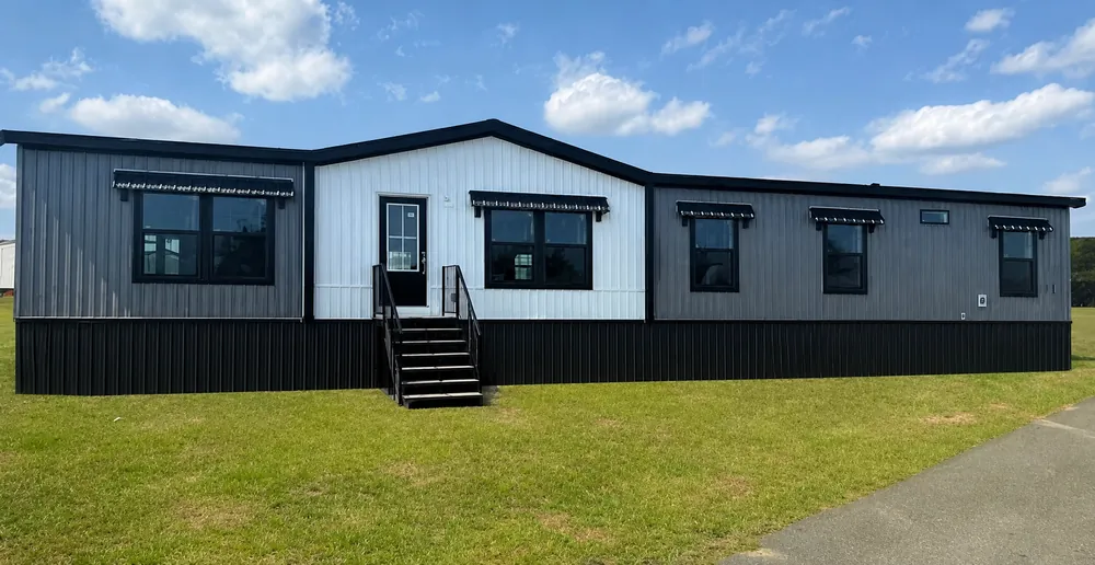 Buccaneer Tyra double-wide with modern two-tone siding